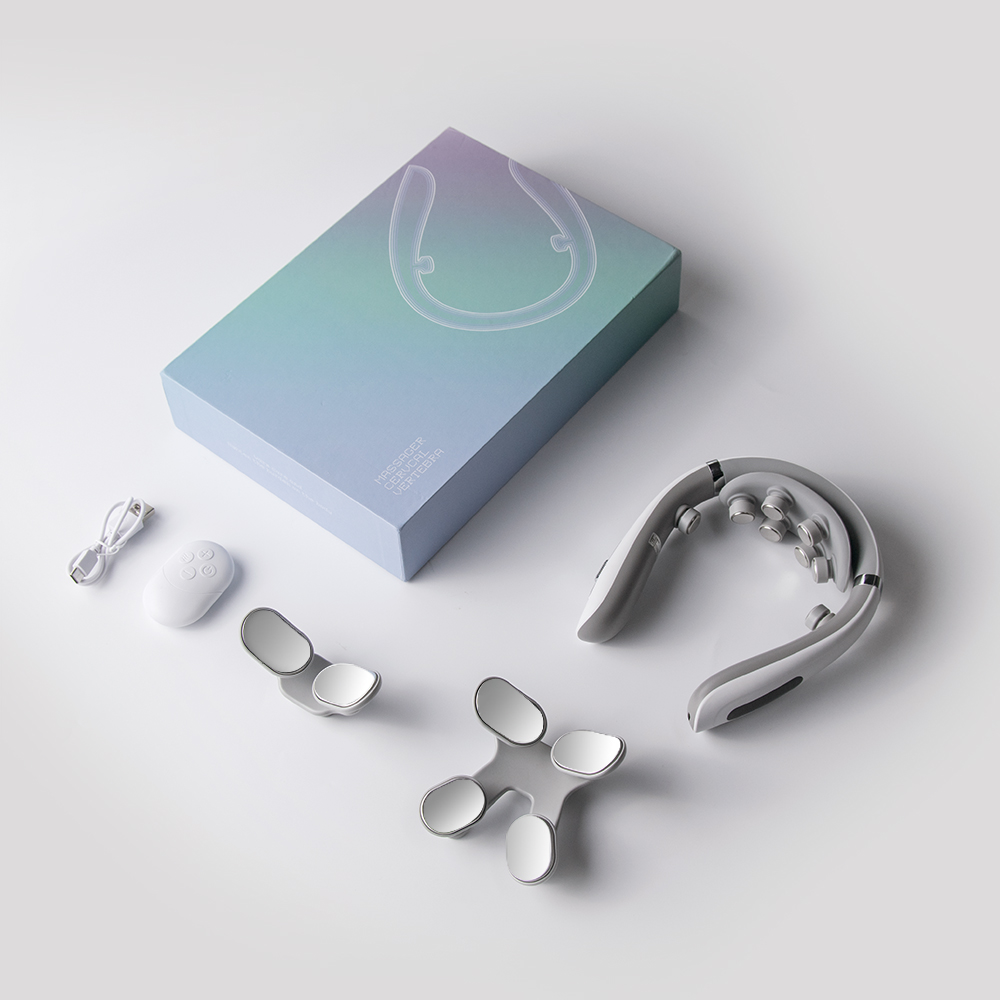 F12 kit photograph showing the wireless remote next to the neck massager and accessories